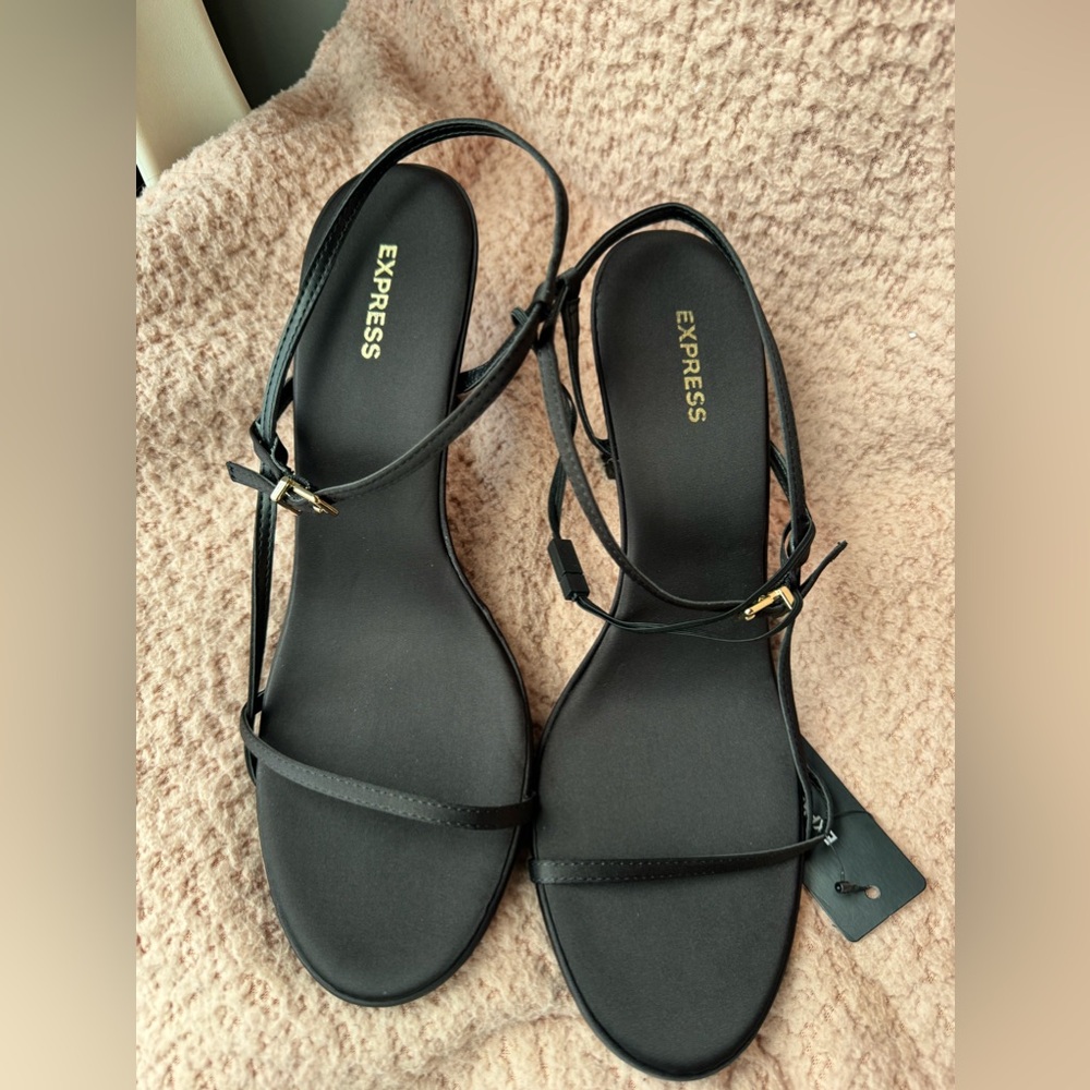 Express size 9 black heels. Brand new, never worn.